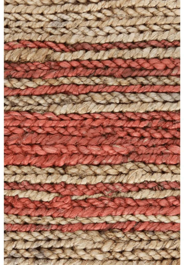 Crimson Brush Jute Dhurrie rug showing bold red brush-stroke accents on natural jute texture.