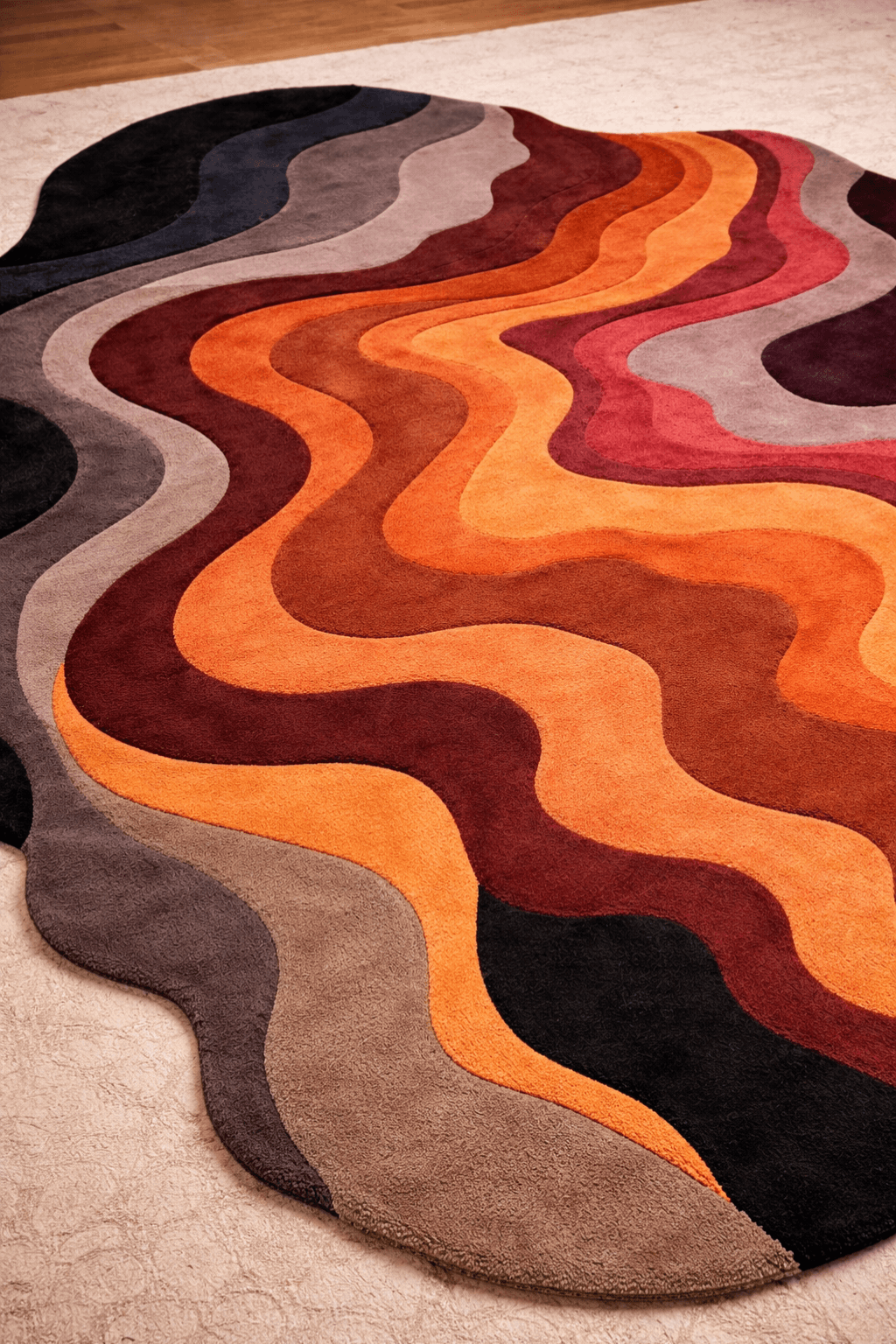 Canyon Flow Contour Rug with flowing burnt orange, terracotta, and burgundy designs inspired by natural landscapes