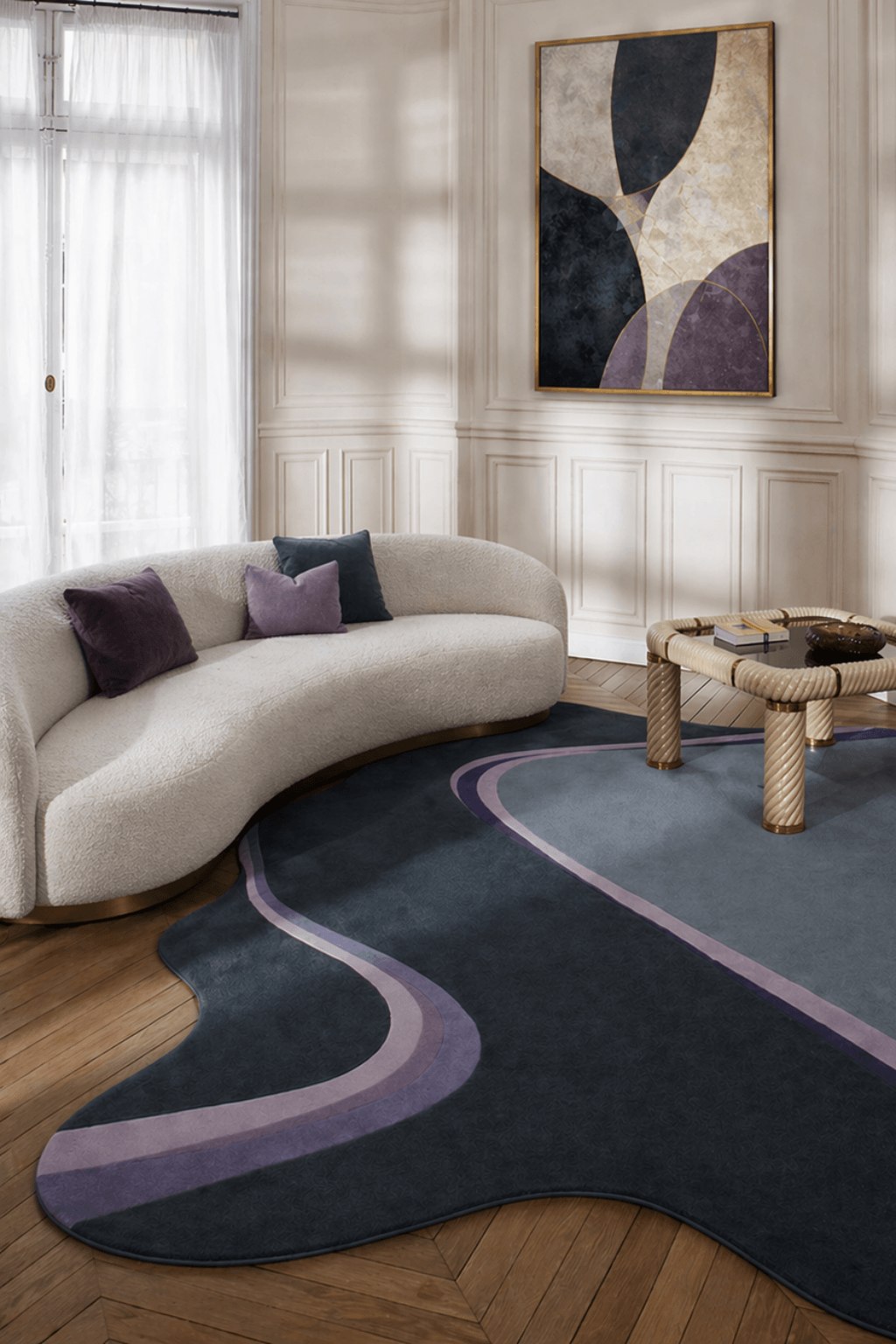 Midnight flow sculpted rug displayed in a modern living room with a curved sofa and artistic decor.
