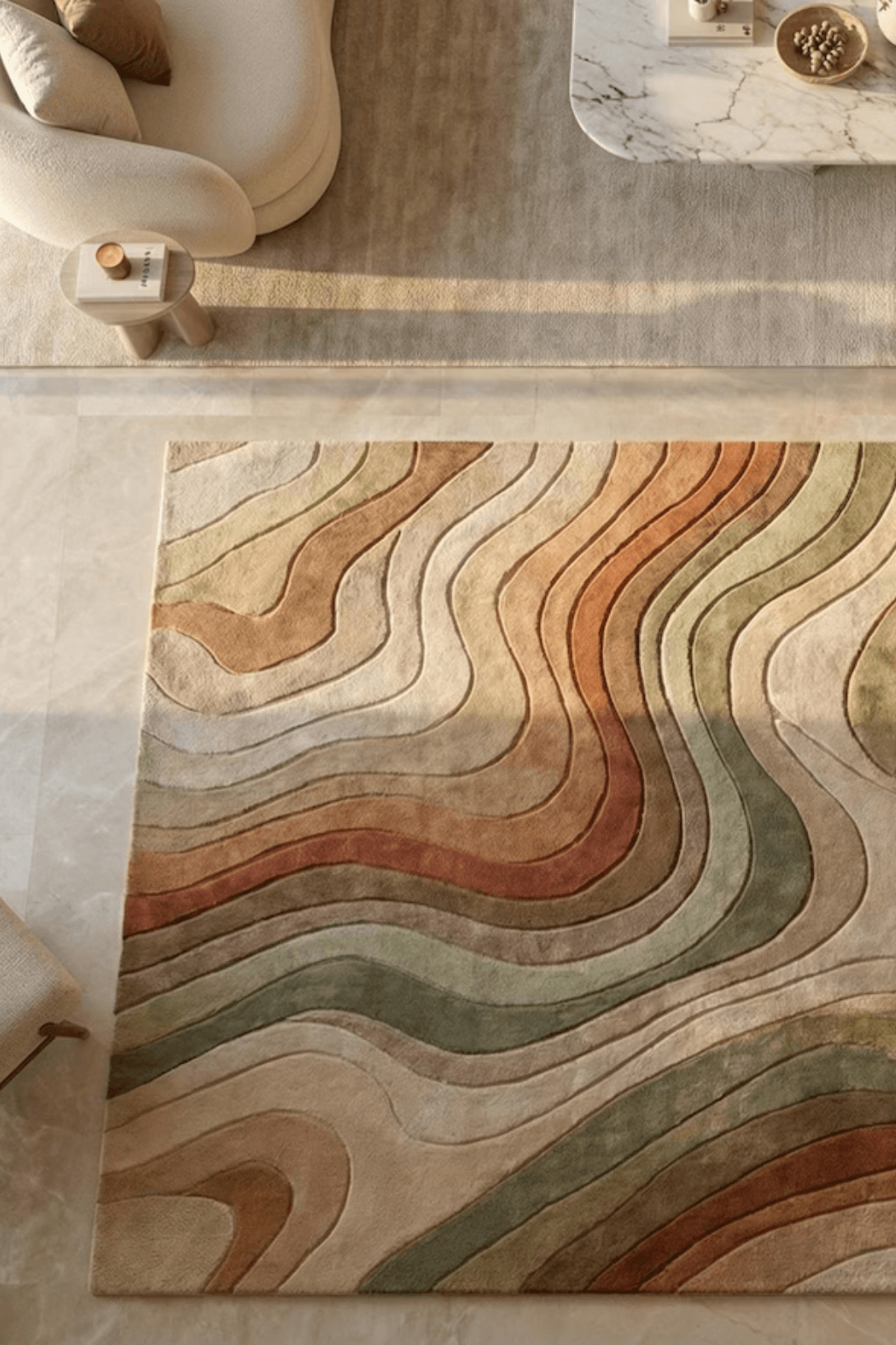 Scallop area rug with flowing scalloped edges and vibrant tonal gradients in a stylish living space.