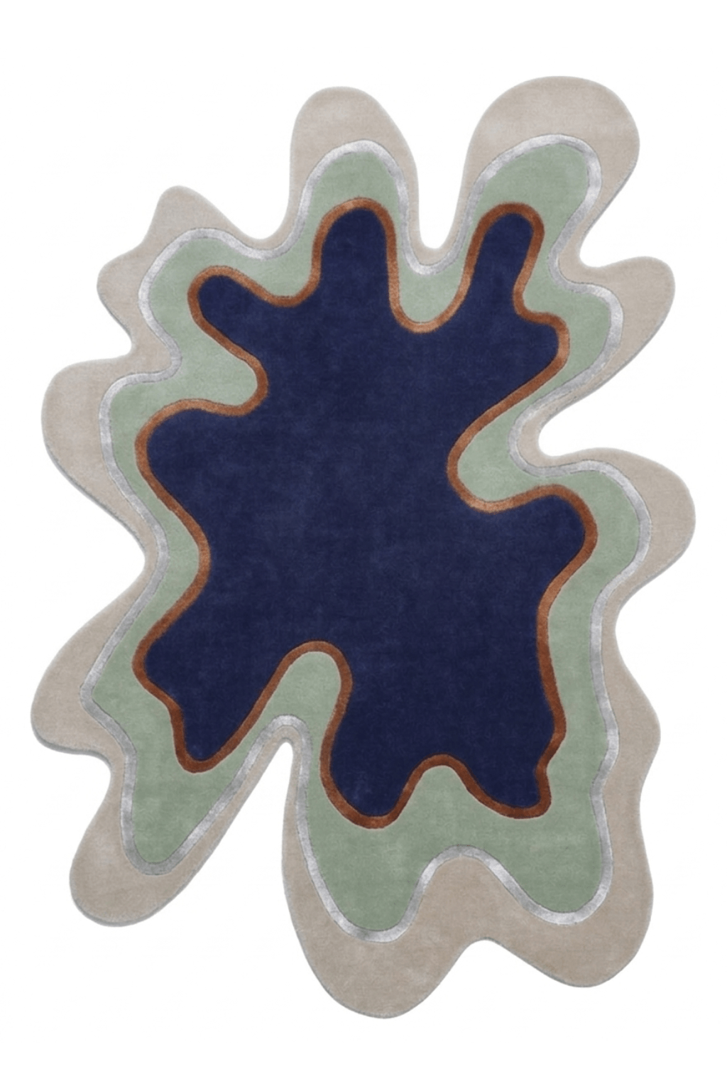 Azure Ambiance irregular hand-tufted rug featuring a bold, organic shape with blue and green colors.