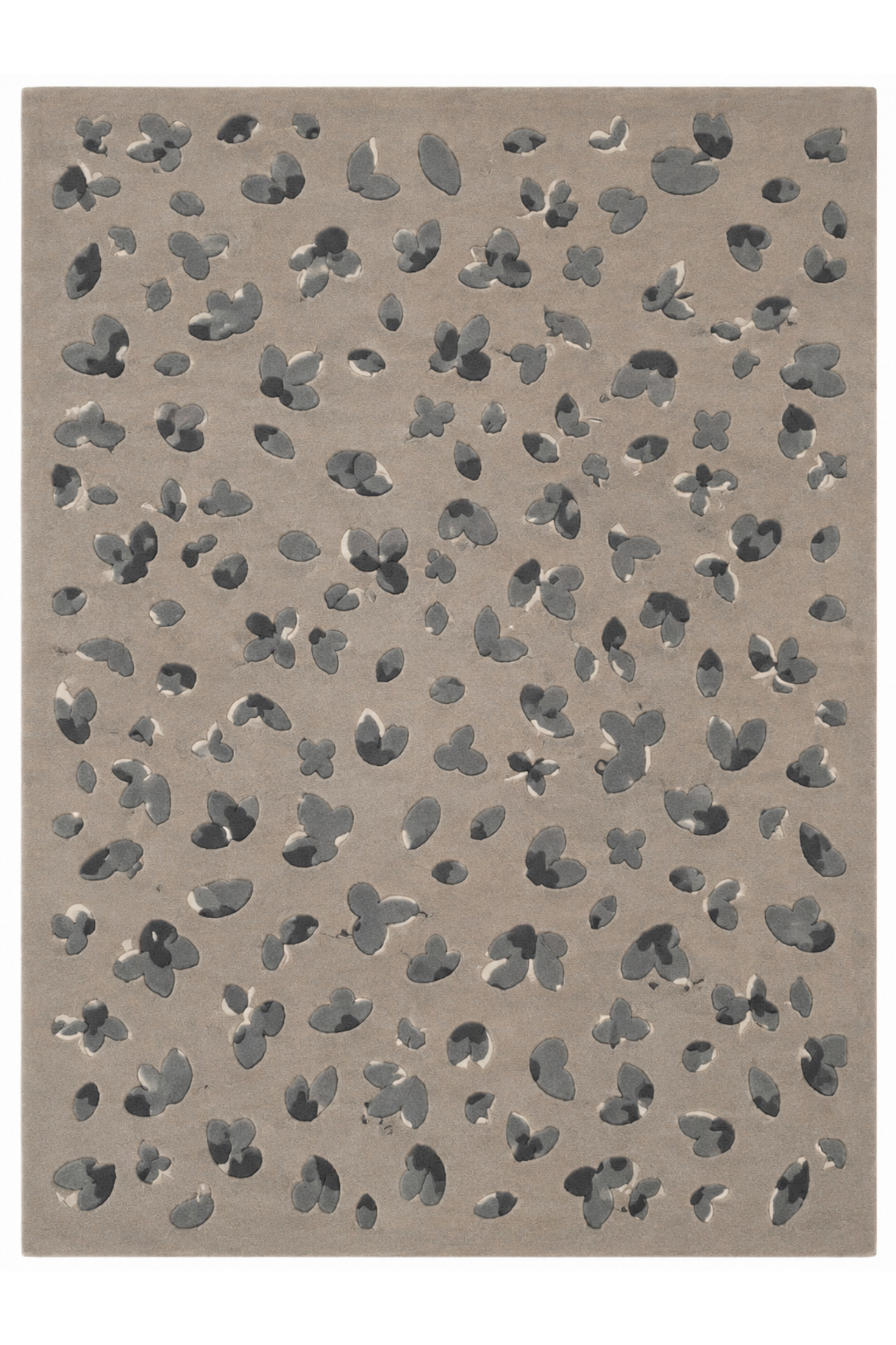 Hand-tufted floral rug featuring delicate butterfly silhouettes on a warm neutral background.