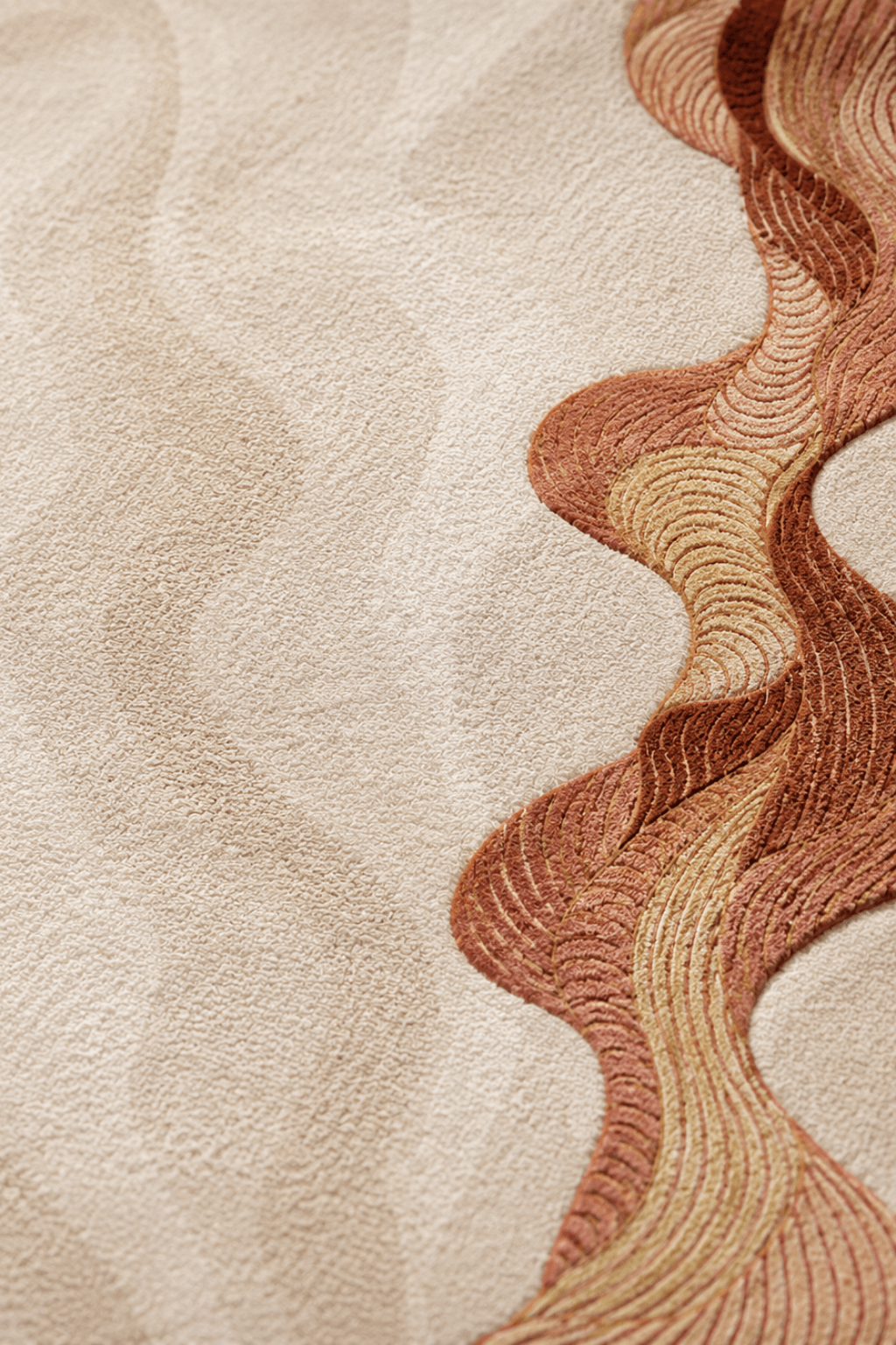 Sienna Flow Sculpted Rug showcasing soft ivory base and flowing terracotta-toned organic borders.