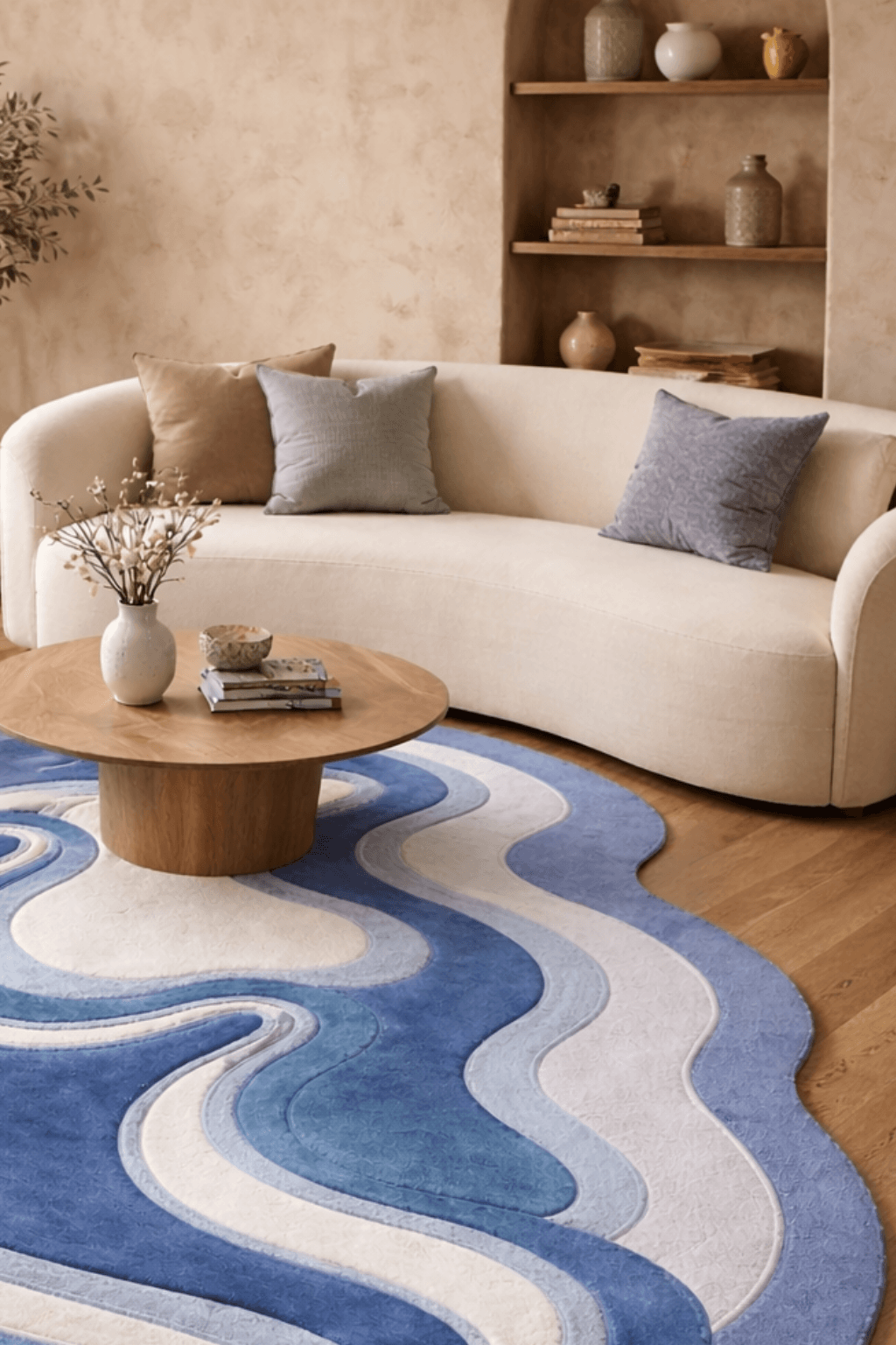 Azure contour rug displayed in a cozy living room with a beige sofa and coffee table.
