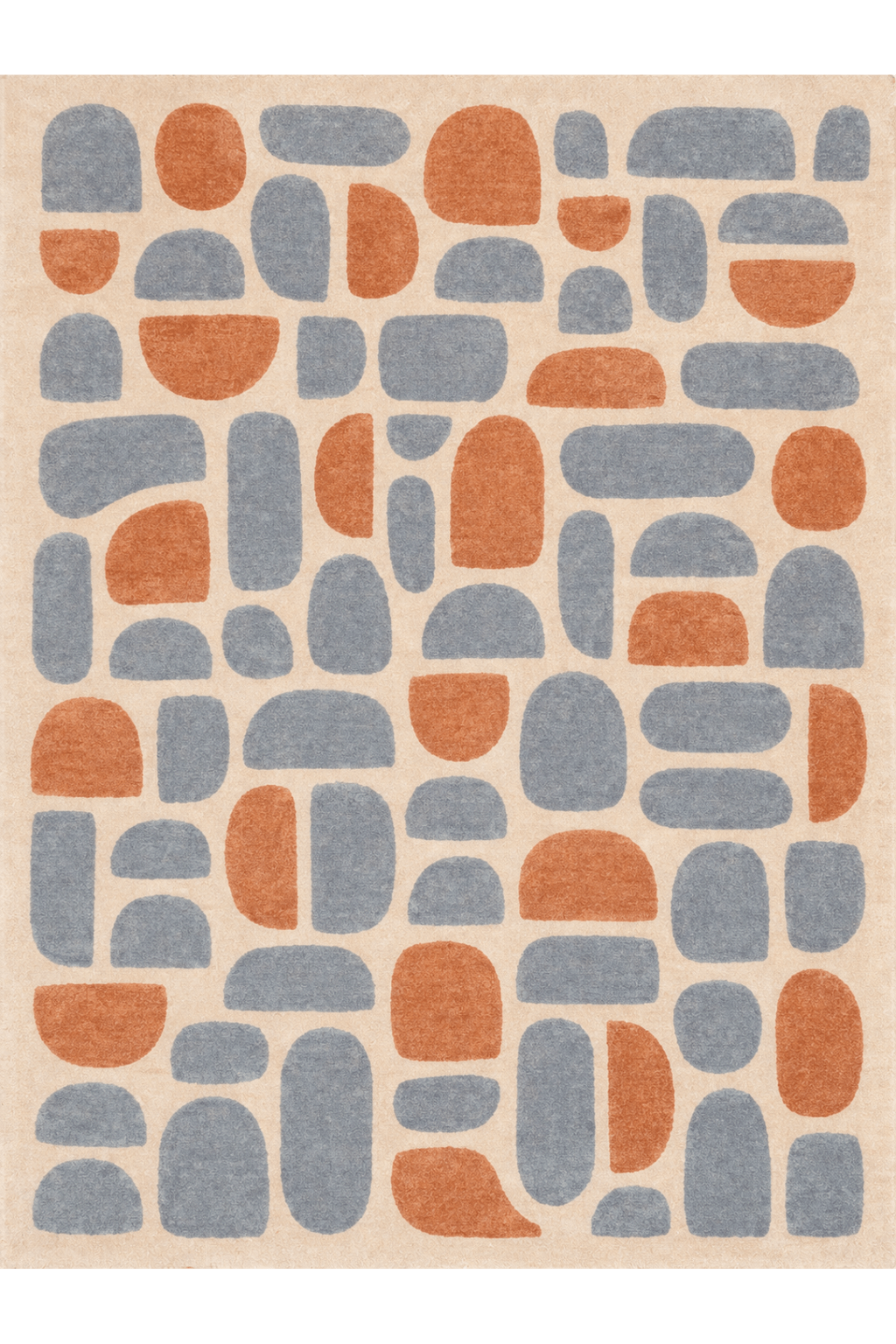 Hand-tufted wool area rug featuring soothing slate blue and warm terracotta abstract shapes.