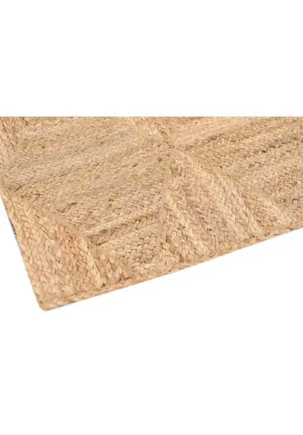 Natural jute round rug featuring a braided weave and textured surface, enhancing home decor.