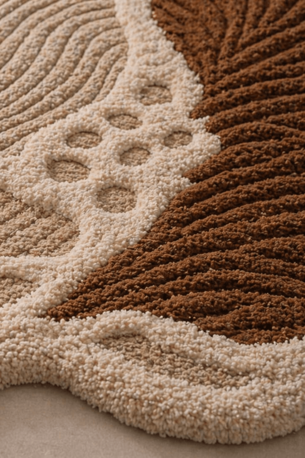 Close-up of earthen contour rug showcasing organic textures and earthy tones.