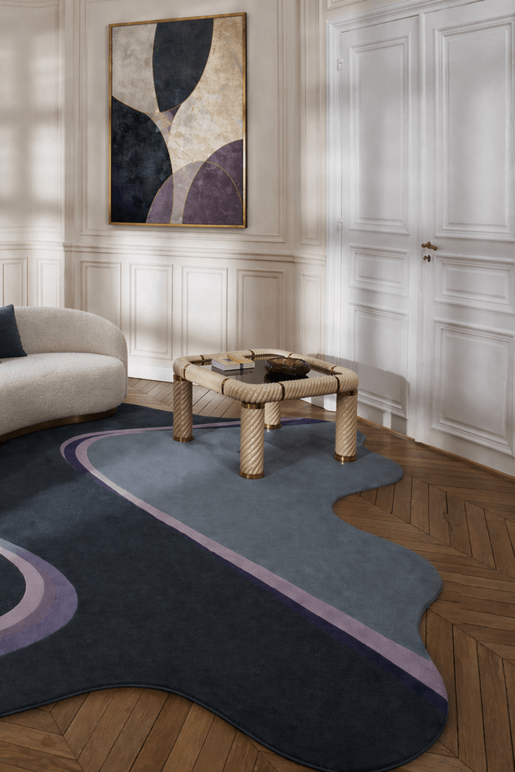 Midnight flow sculpted rug displayed in a stylish modern interior with a contemporary artwork and furniture.