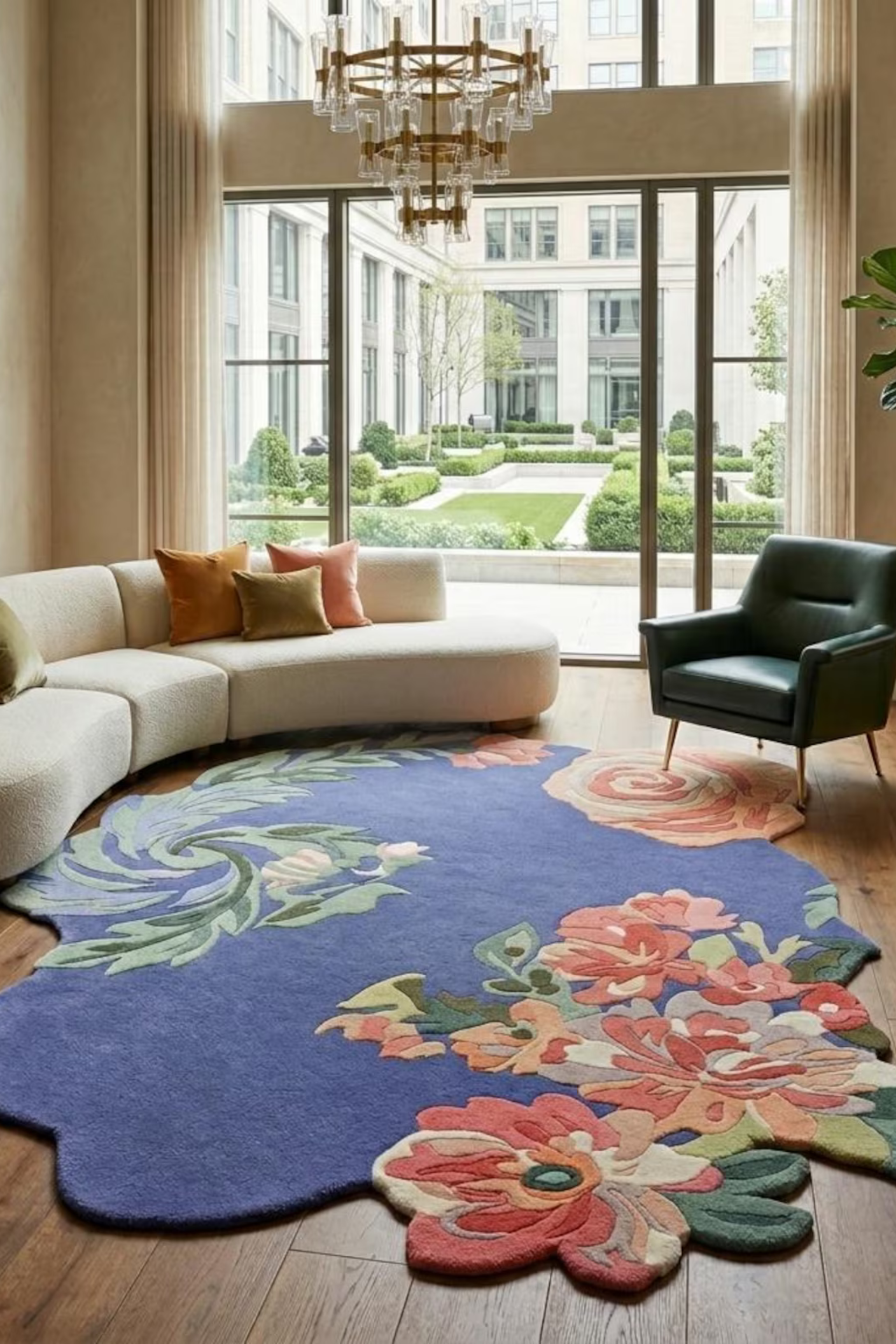 Floral hand-tufted rug displayed in a stylish living room with a modern, elegant design and plush furniture.