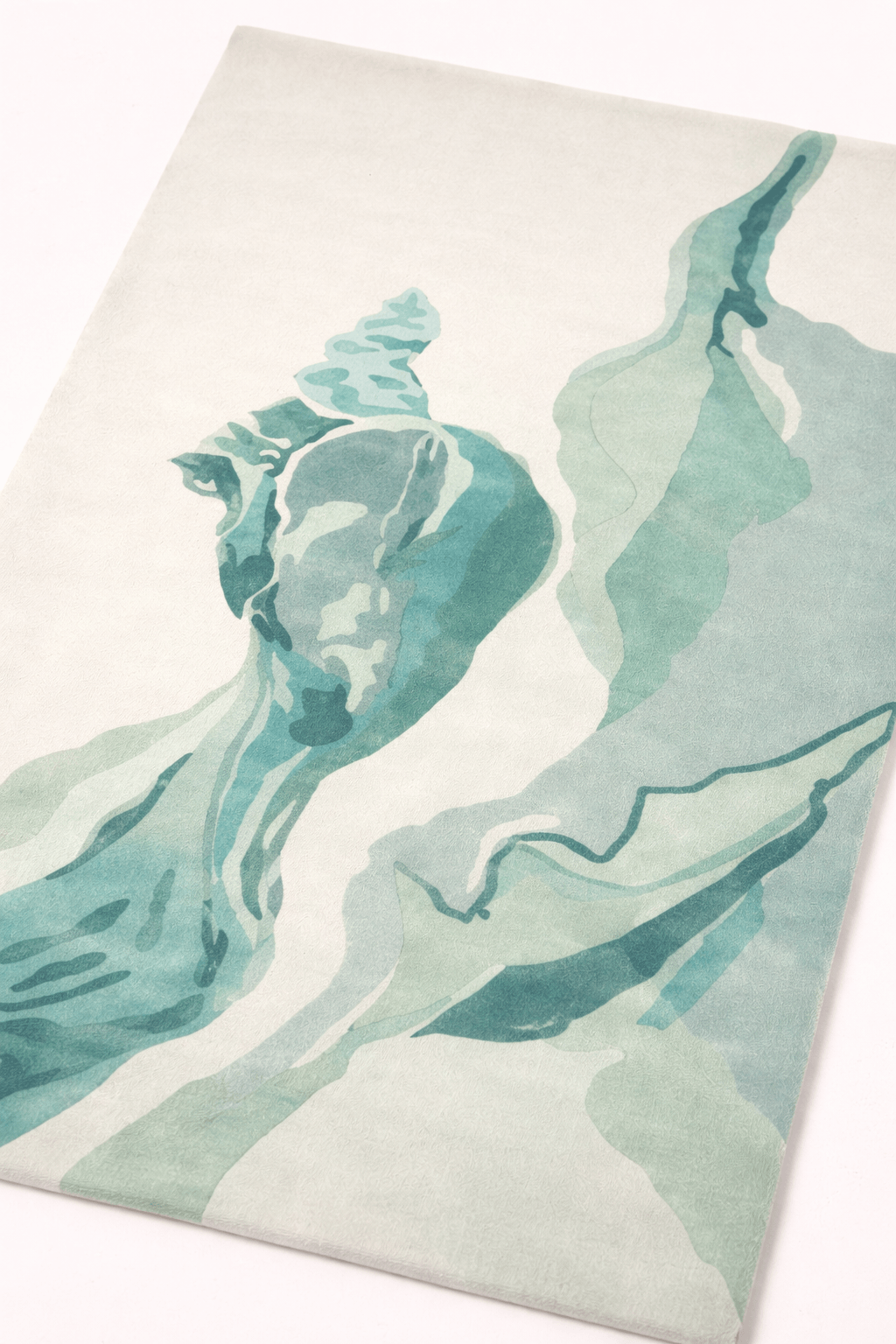 Abstract watercolor area rug featuring soothing shades of aqua and mist green on a neutral base.