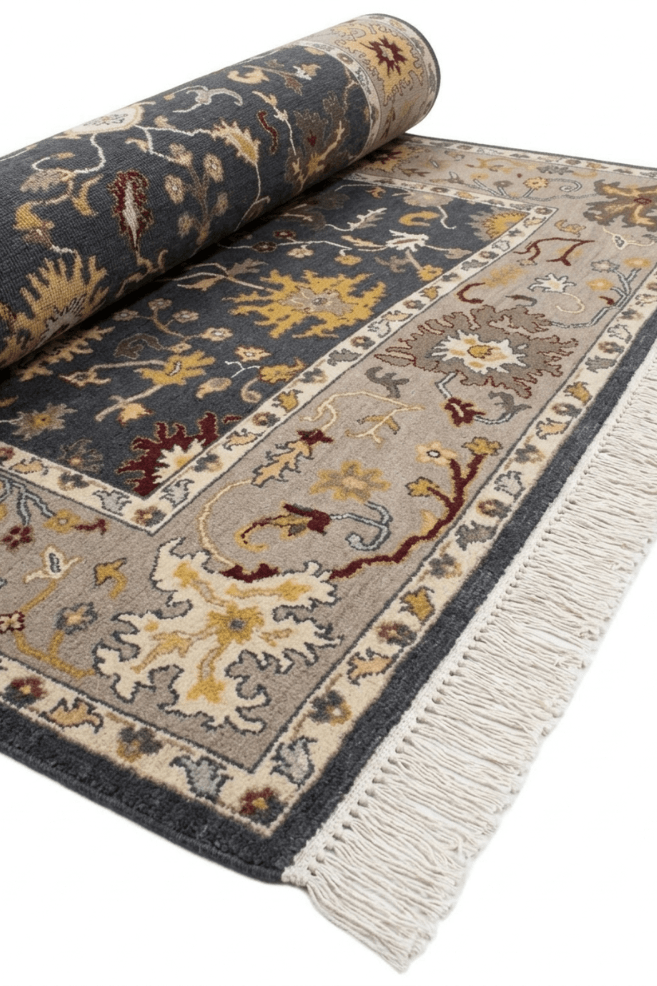 Heritage hand-knotted oushak rug with charcoal and ochre design, showcasing intricate patterns and fringed edges.