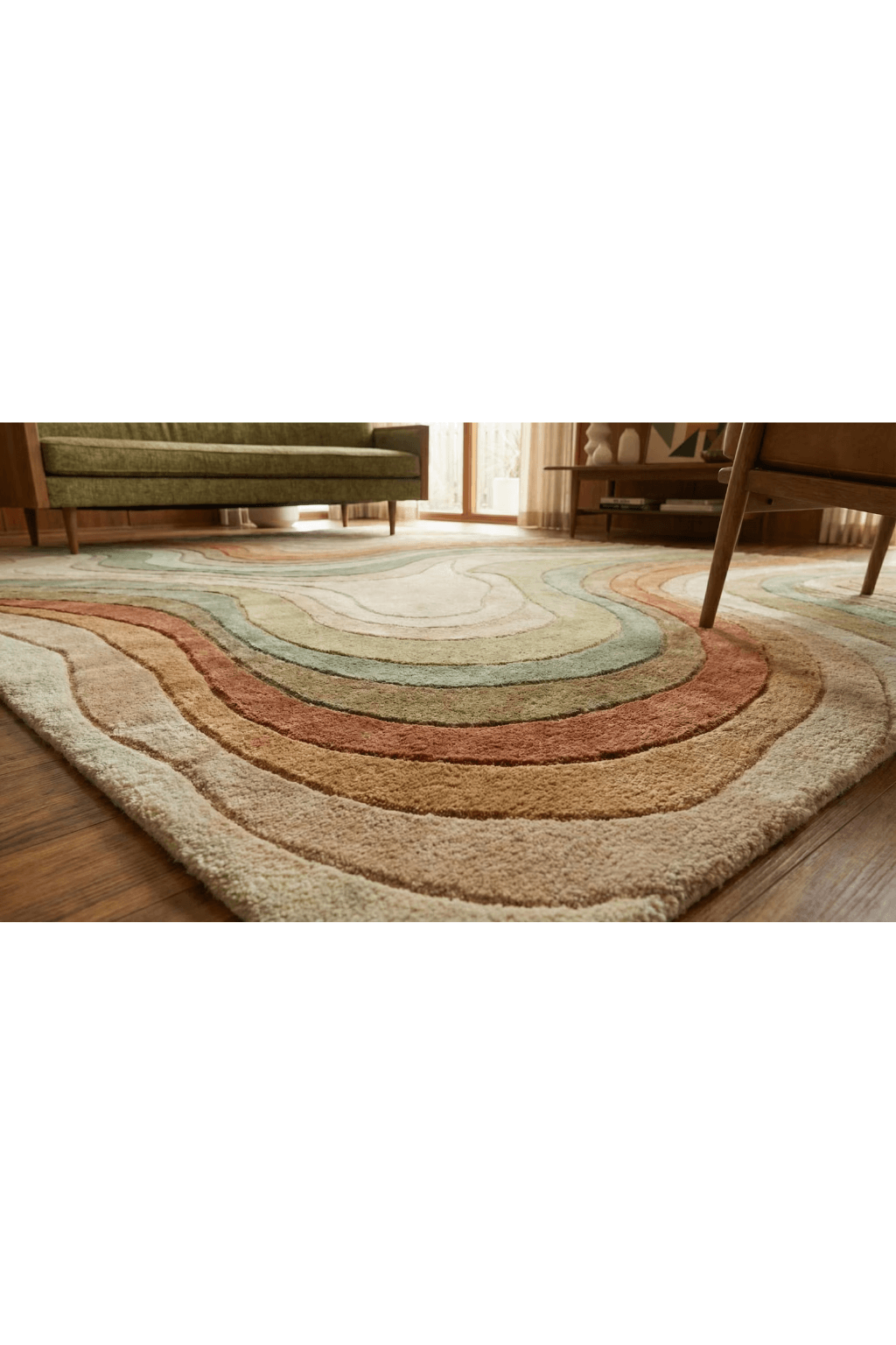Sand Dune Contour Scallop Rug featuring scalloped edges and tonal gradient in a cozy living room setting.