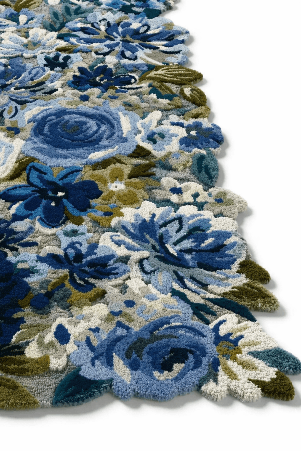 Hand-tufted floral area rug showcasing intricate blue and ivory floral designs, adding elegance to any space.