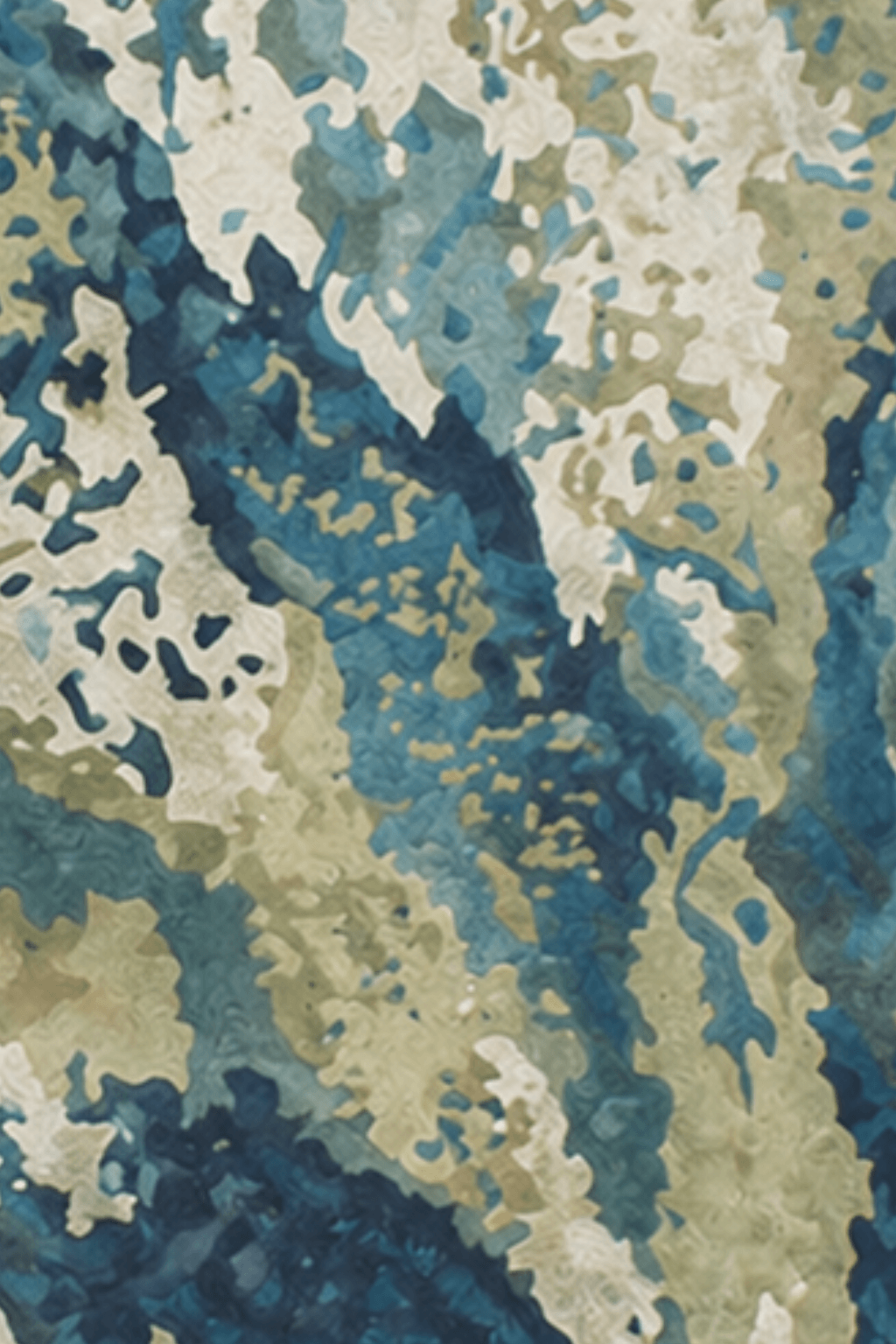 Ocean Terrain Sculpted Rug with intricate blue and natural tones mimicking organic water flow.