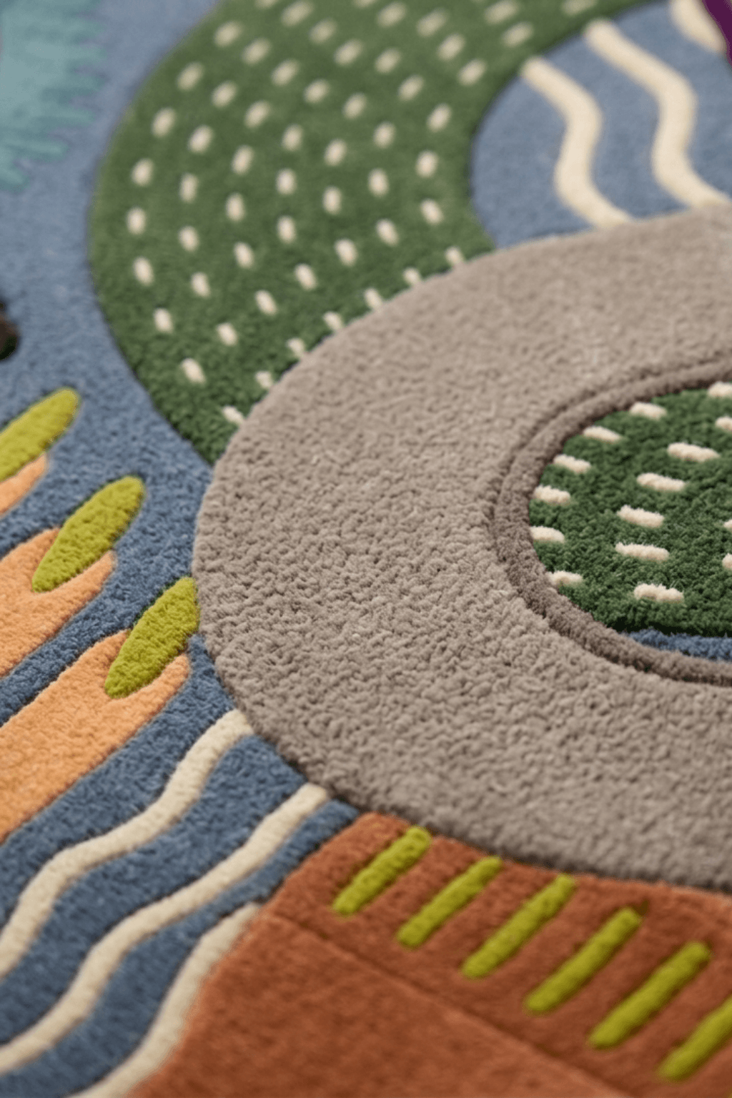 Close-up of the Chroma-Flow irregular area rug showcasing its unique design and colorful patterns.