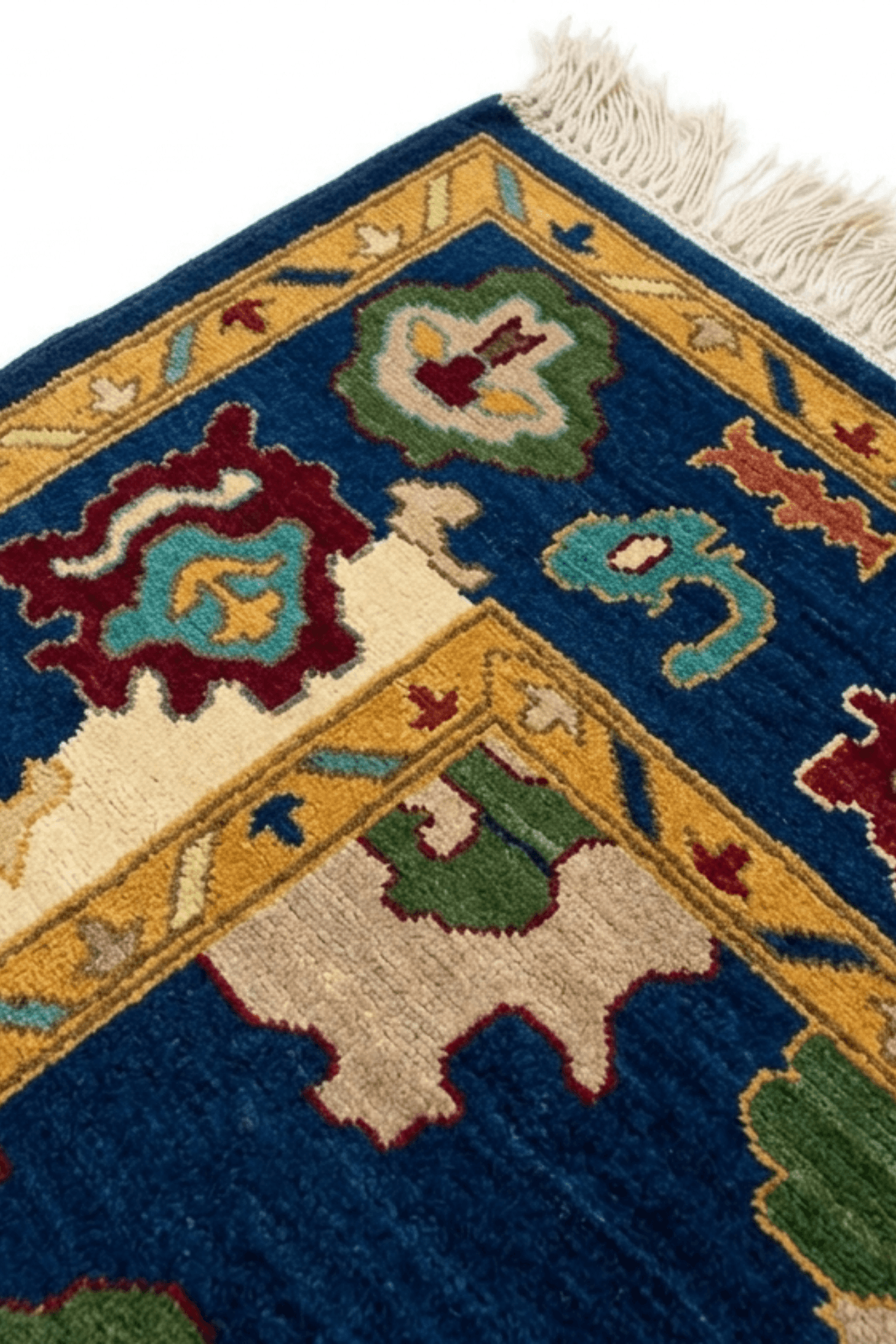 Heritage Bloom deep blue hand-knotted wool rug featuring elegant floral and geometric motifs.