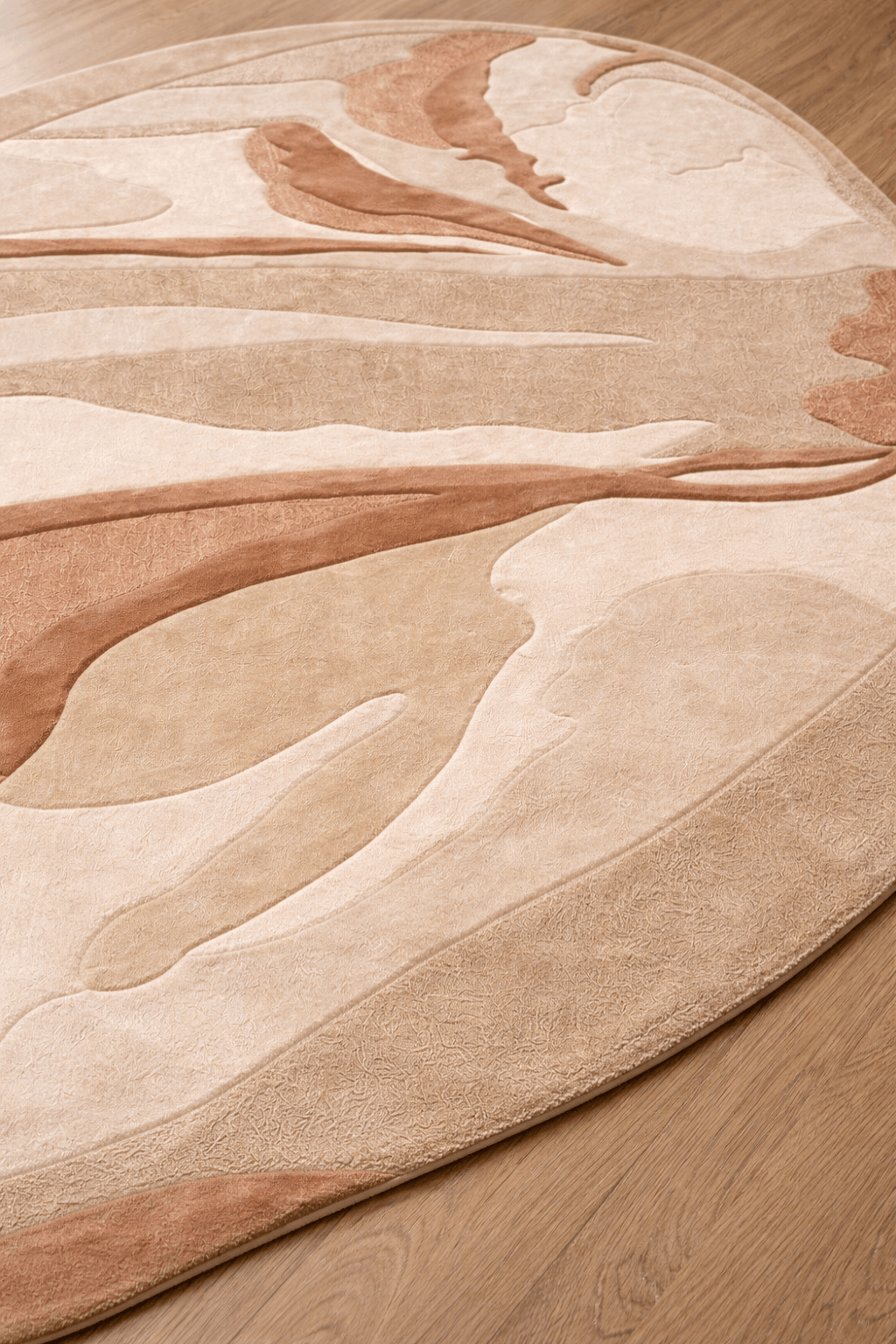 Desert abstract rug showcasing soft, flowing patterns in shades of sand and terracotta.