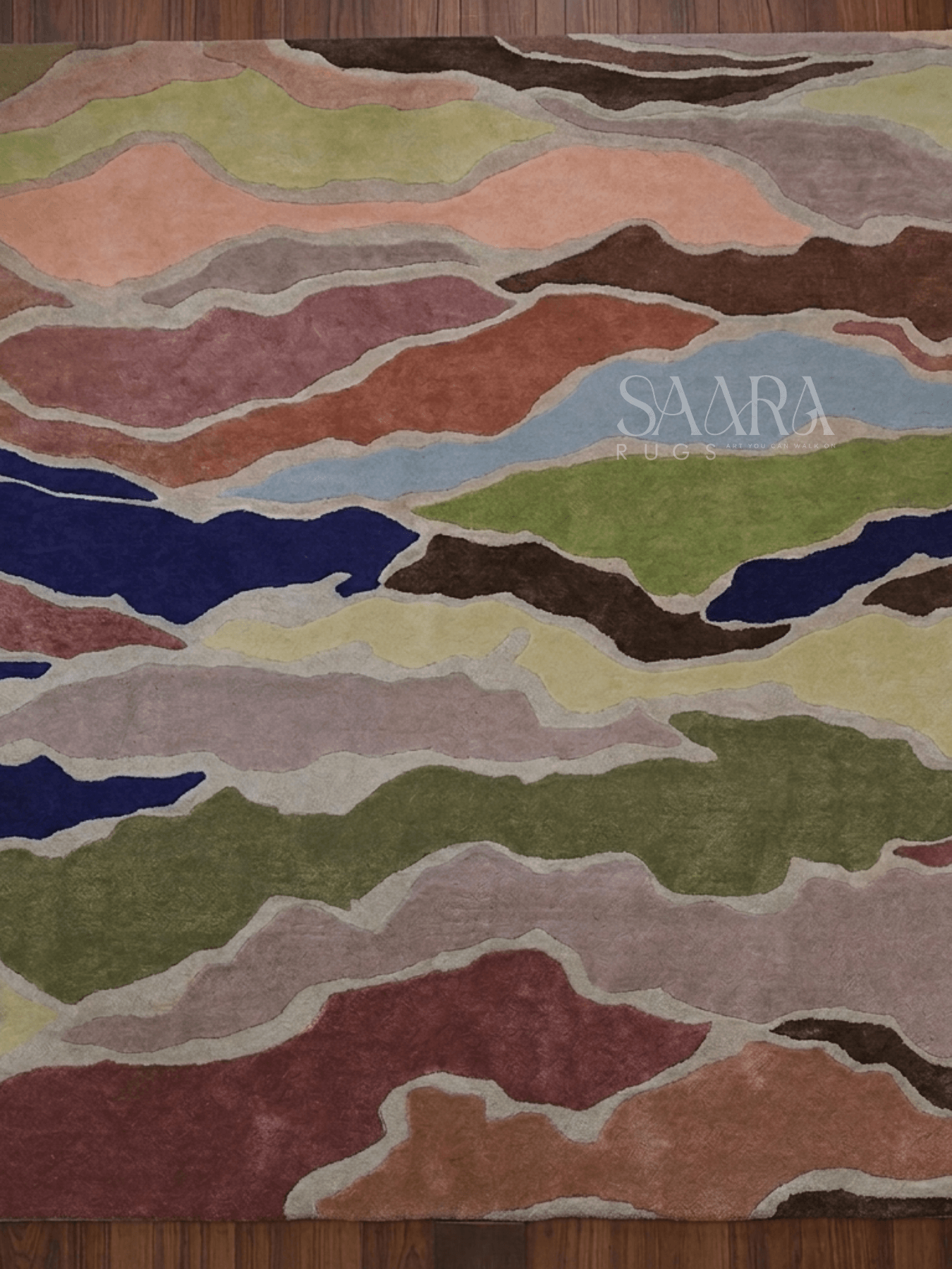 Modern abstract multicolor rug featuring vibrant colors like olive, rust, blush pink, and deep blue in a stunning design.