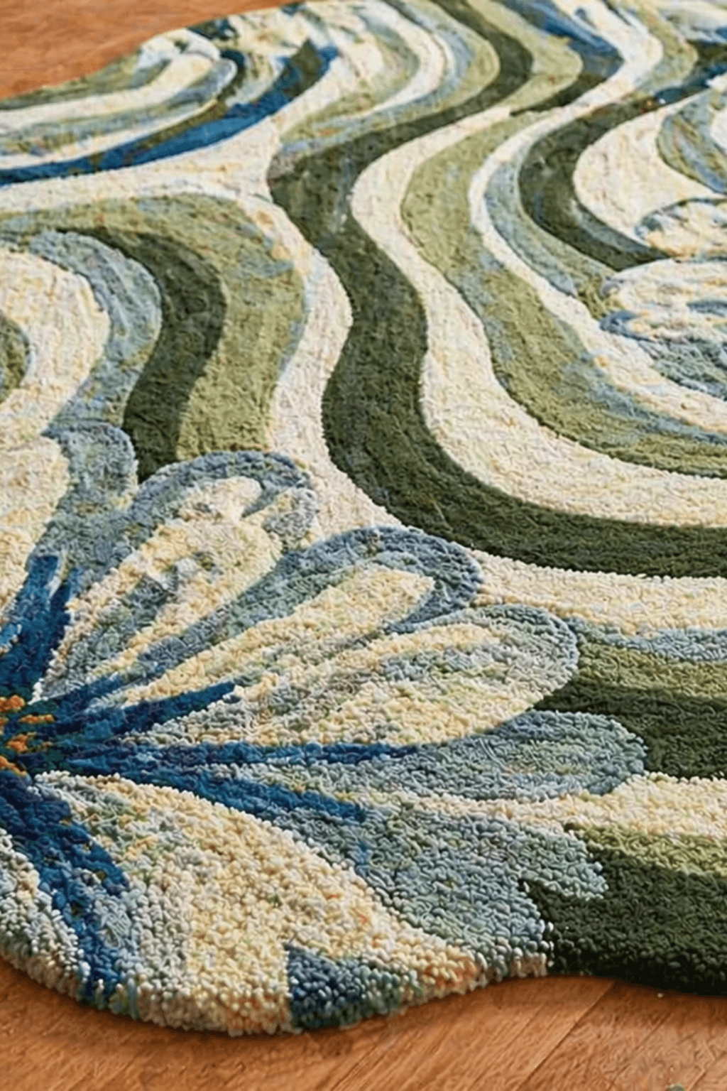 Close-up of the Verdant Wave Floral Rug showcasing modern floral area rug design with flowing green and blue patterns.