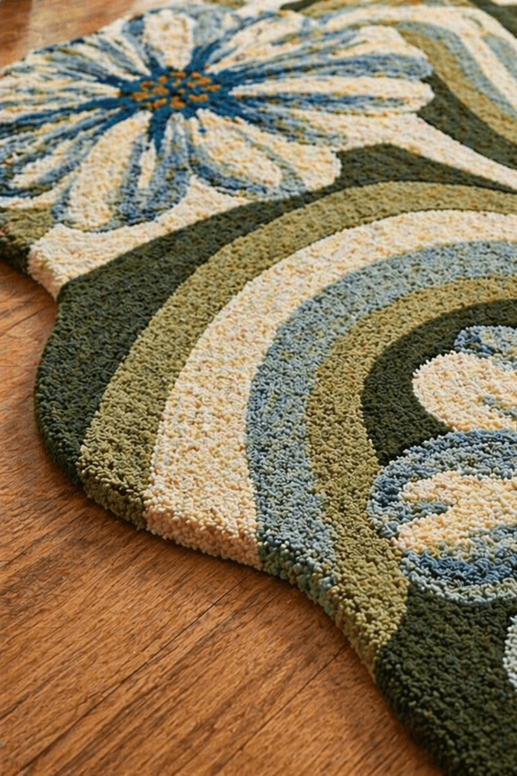 Modern floral area rug featuring bold colors and sculpted floral designs, enhancing interior elegance.