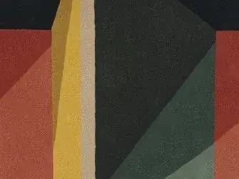 Close-up of the Facet Mirage Hand-Tufted Rug showcasing bold geometric patterns and vibrant colors.