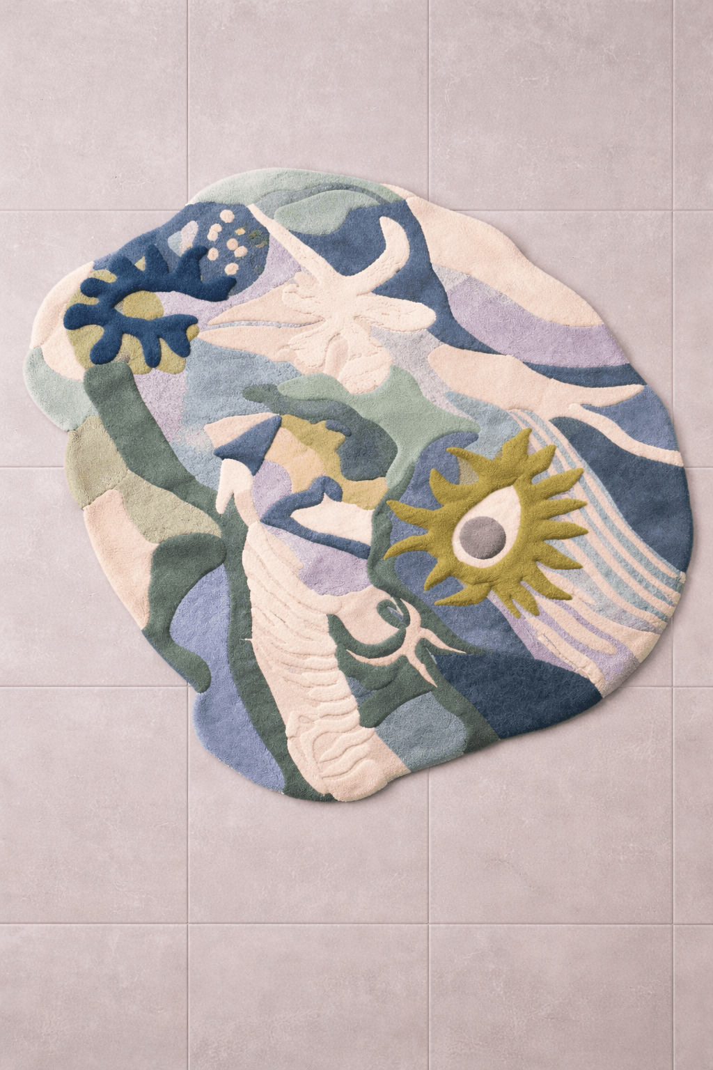 Celestial Terra – Abstract Art Hand-Tufted Rug displayed on a tiled floor with flowing shapes and vibrant colors.