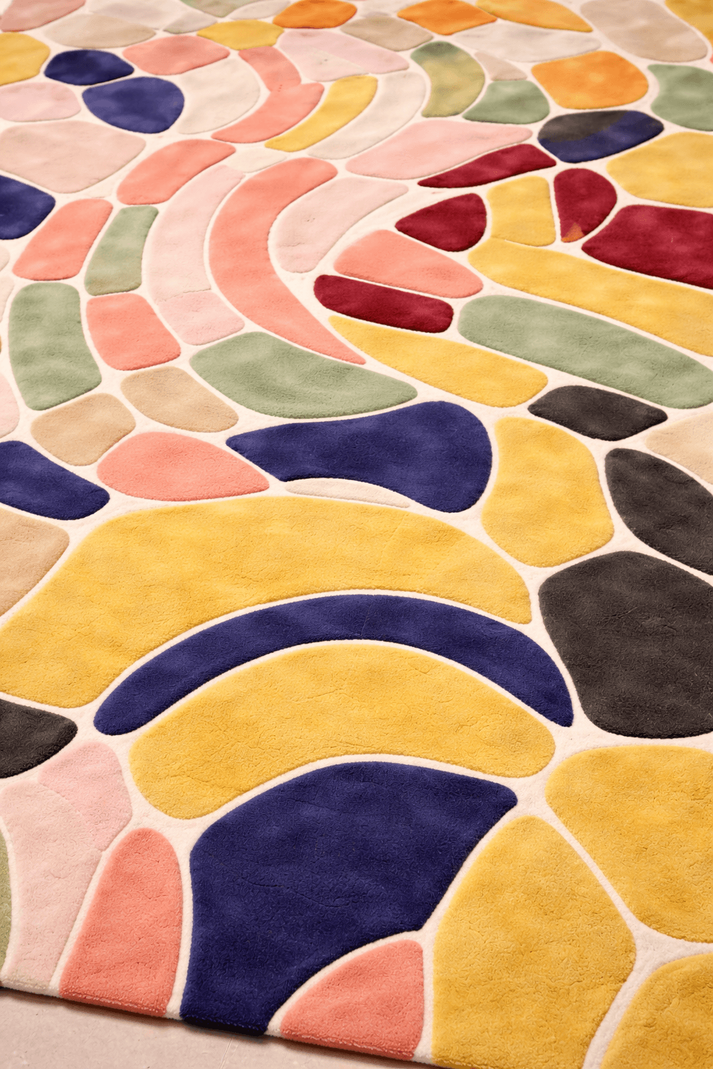 Abstract Mosaic Hand-Tufted Rug featuring vibrant colors and artistic design, perfect for enhancing any interior.