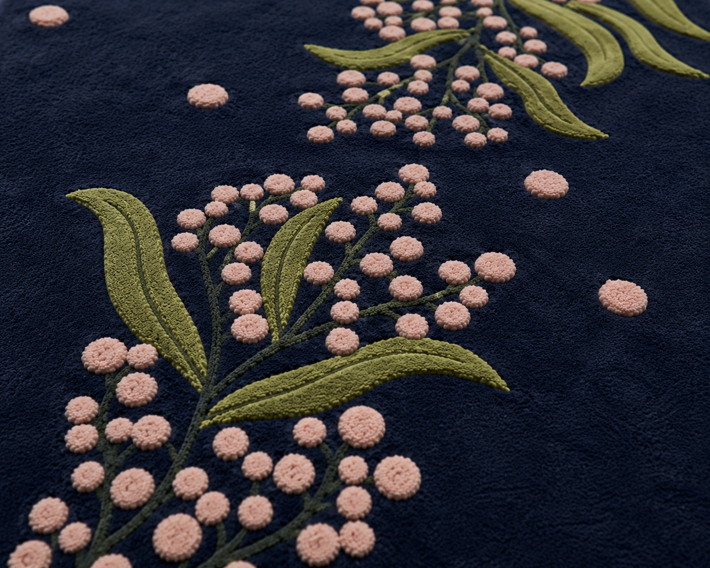 Midnight berry floral rug featuring delicate blush berries and olive-green foliage on a dark navy background.