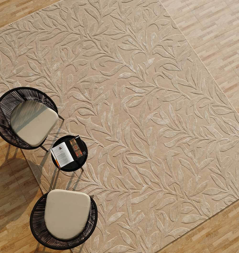 Serenity Leaf Hand-Tufted Rug with intricate leaf pattern in soft neutral tones, enhancing modern interiors.