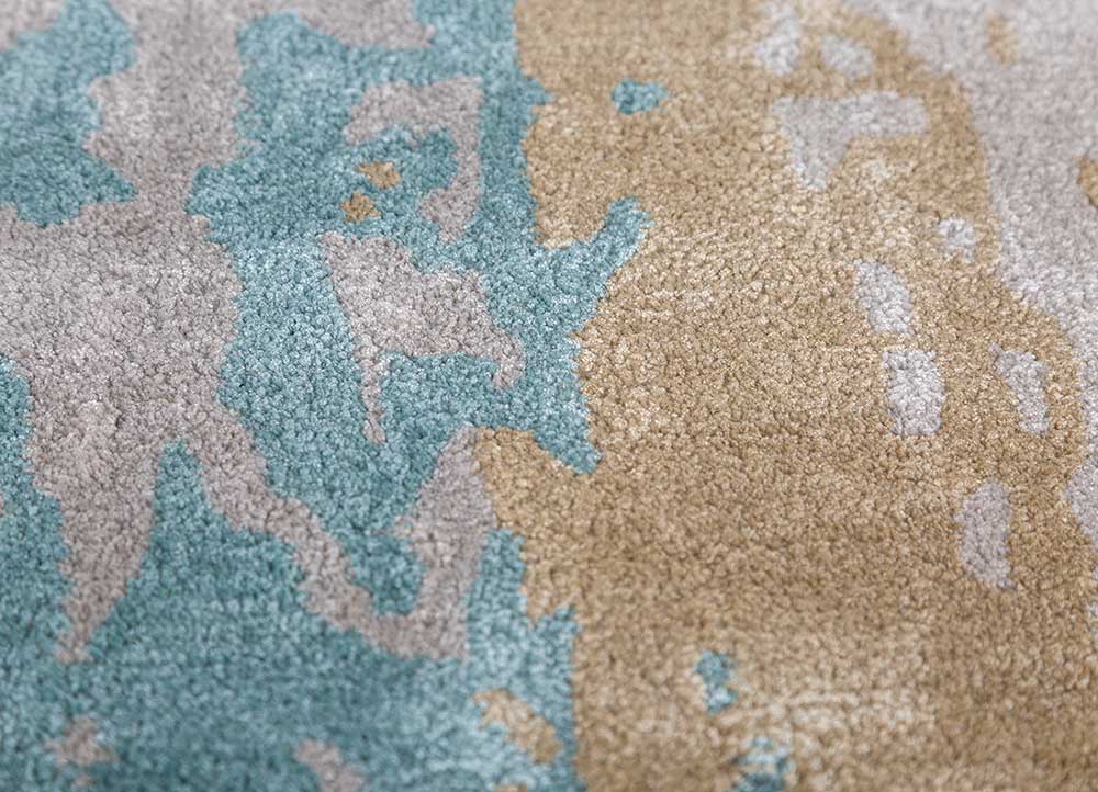 turquoise/gold hand tufted  Rugs