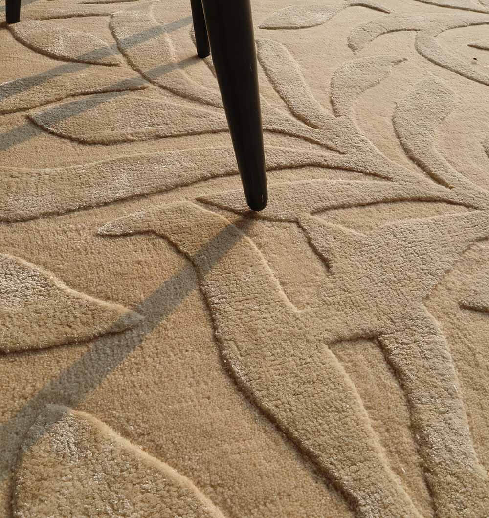 Close-up of the Serenity Leaf Hand-Tufted Rug showcasing its intricate leafy pattern and soft textures.
