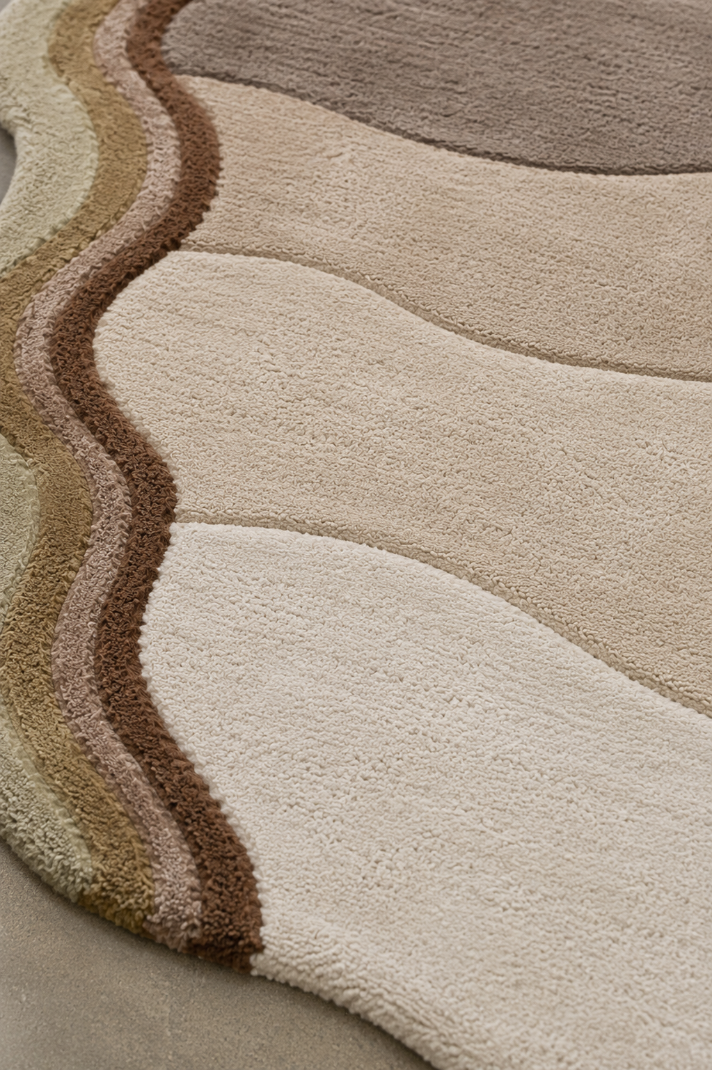 Close-up of the Terra Tide Rug showcasing warm earth tones and organic contours, a perfect organic contour area rug.