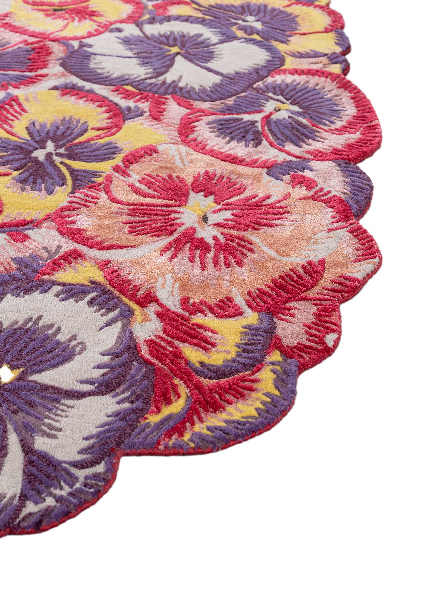 Candy pink hand tufted rug with floral designs, adding a luxurious touch to any modern living space.