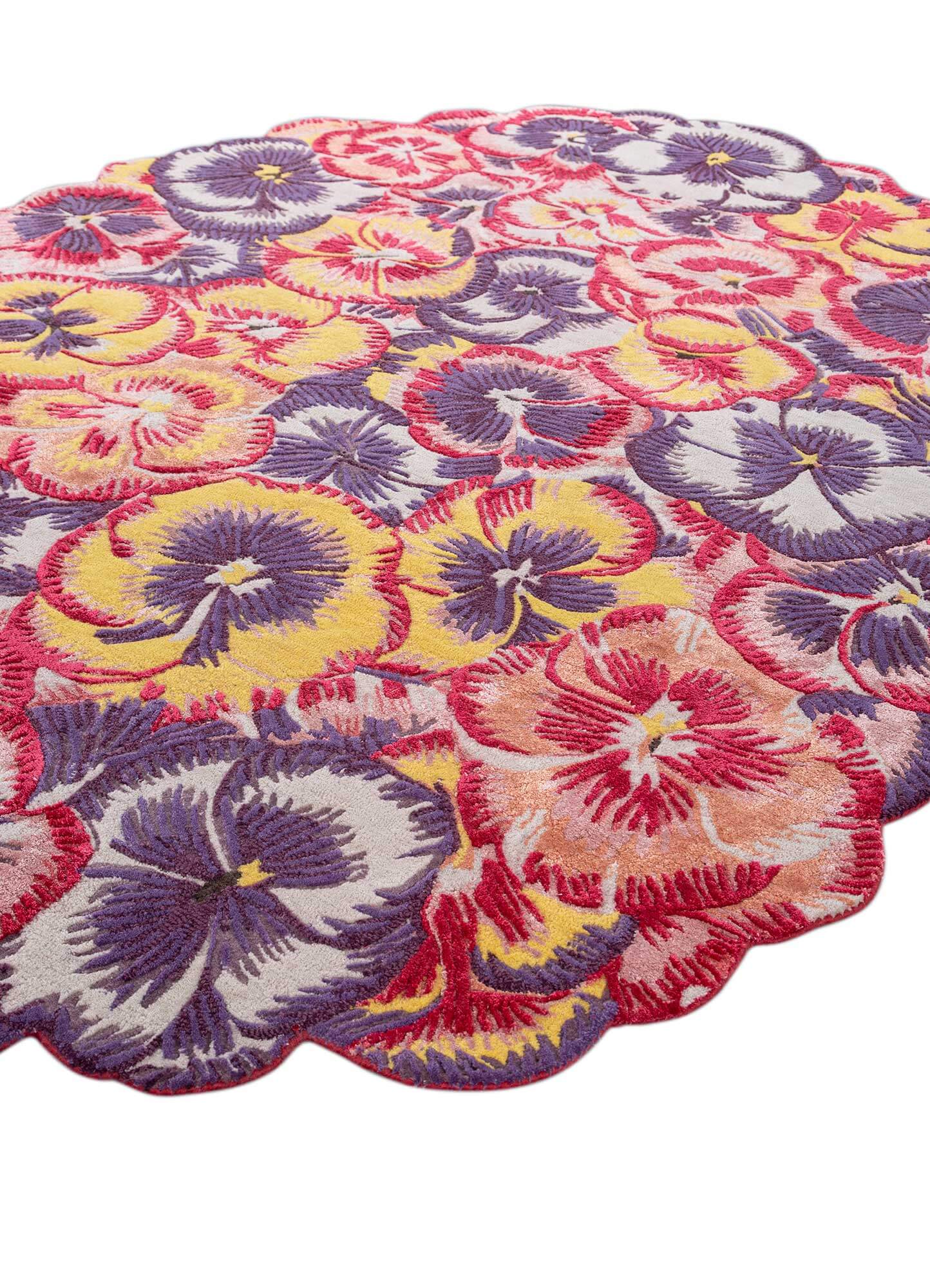 Candy pink hand tufted rug with vibrant floral design, ideal for adding elegance to modern living spaces.