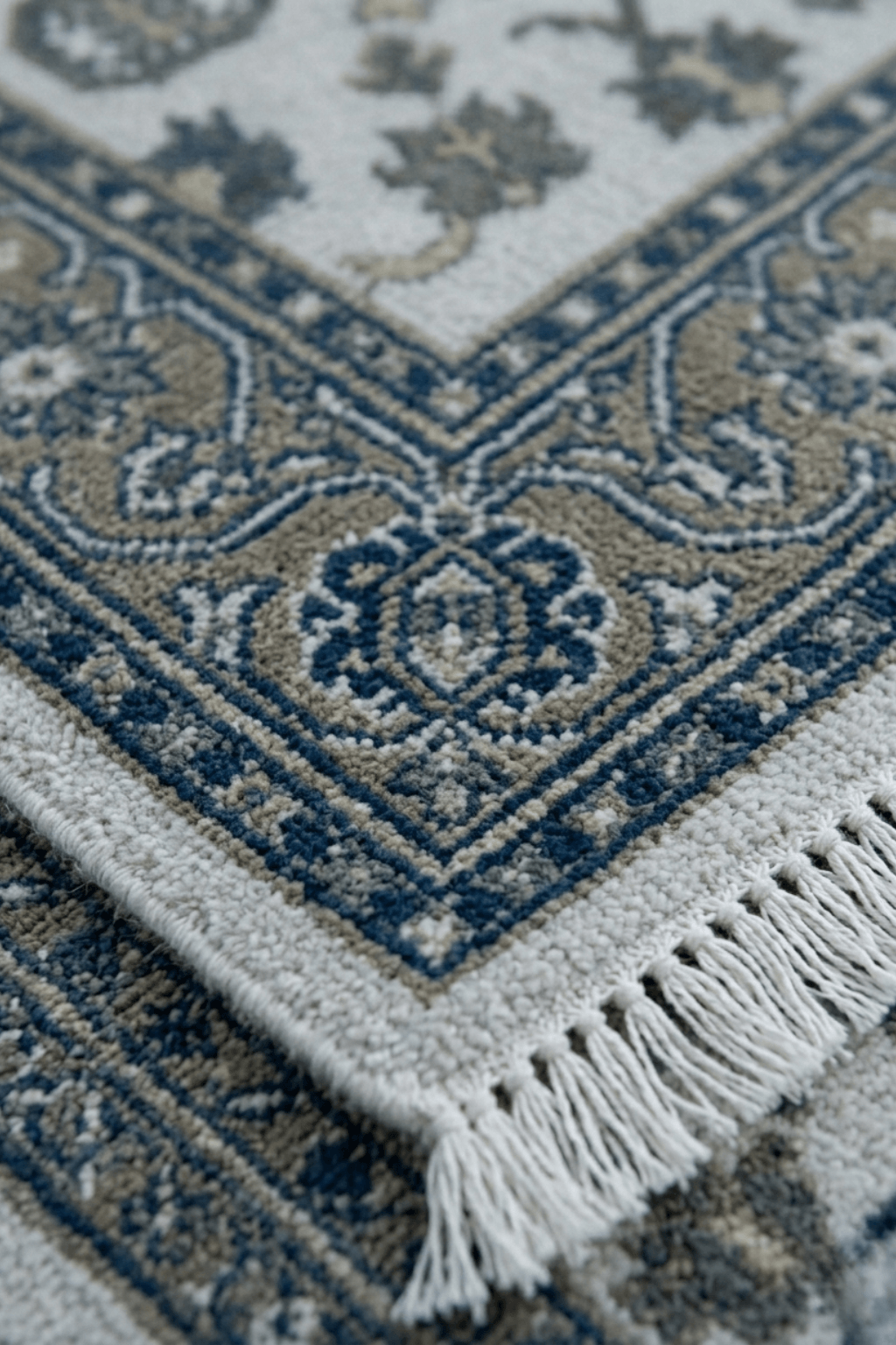 Caspian Heritage – Artisan Hand-Knotted Traditional Wool Rug with intricate designs and fringed edges.
