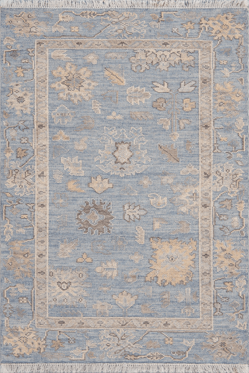 Dusty Blue Artisan Hand-Knotted Rug featuring intricate floral and geometric motifs on a stunning dusty blue background.