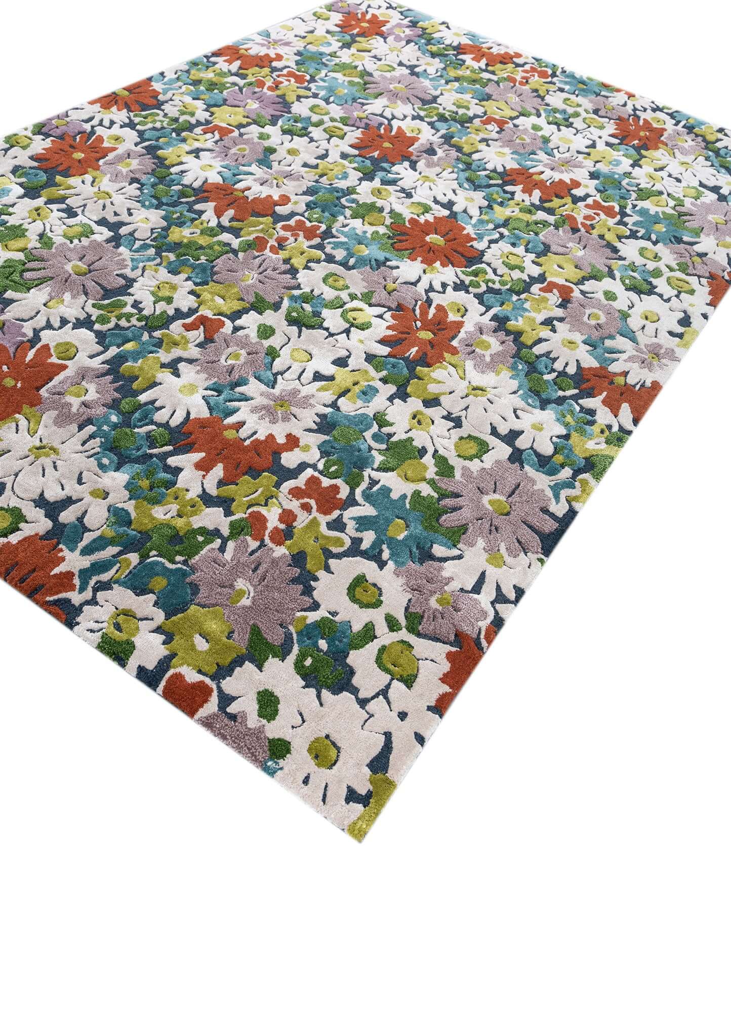 Indigo blue and white hand tufted rug with vibrant floral design, made of high quality wool and viscose.