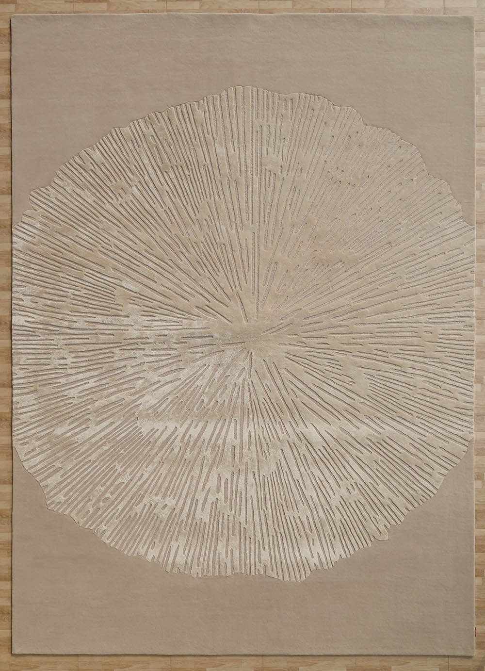 Aurora Bloom Rug featuring a sunburst pattern, blending nature-inspired artistry and modern elegance.