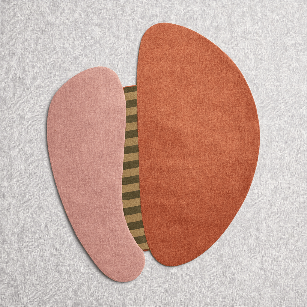 Abstract wool rug for modern home featuring organic shapes in blush pink, terracotta, and olive-beige.