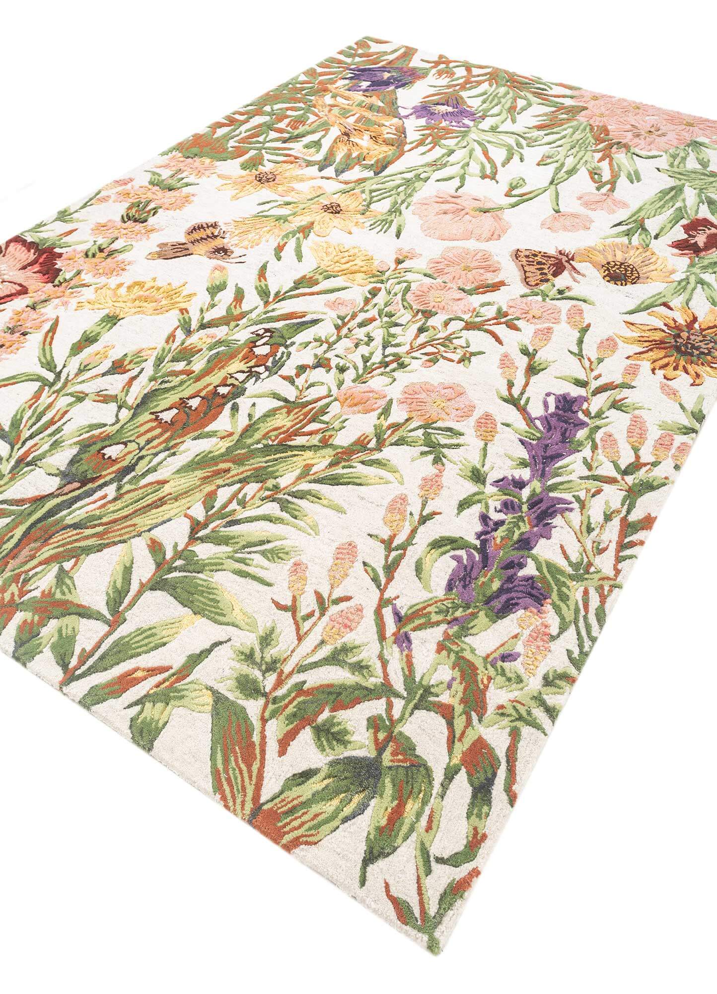 Treetop hand-tufted rug featuring vibrant floral and tropical designs, made from wool and viscose for modern decor.